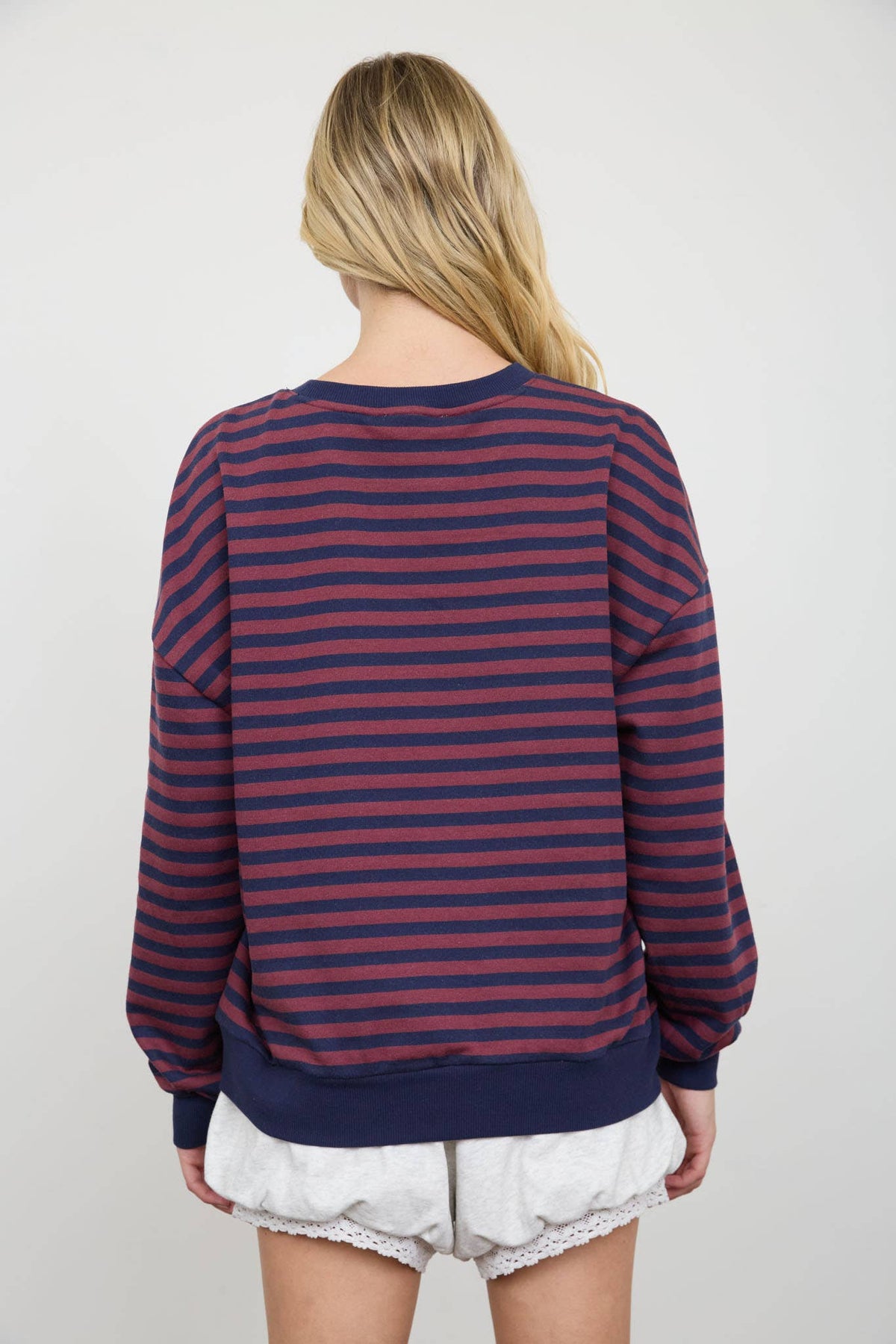 STRIPE V STITCH DETAIL LONG SLEEVE KNIT TOP: NAVY