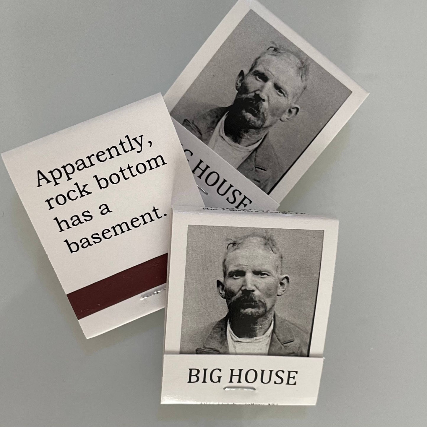 APPARENTLY ROCK BOTTOM HAS A BASEMENT MATCHBOOK