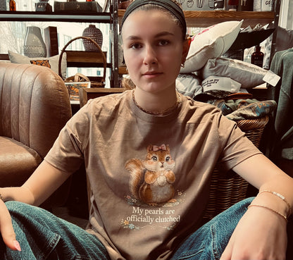 MY PEARLS ARE OFFICIALLY CLUTCHED