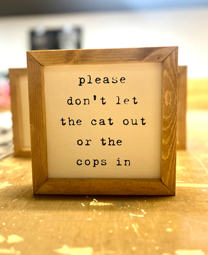 PLEASE DON’T LET THE CAT OUT OR THE COPS IN