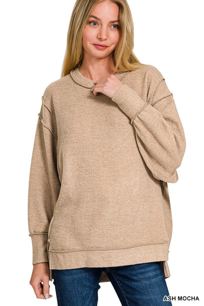 OVERSIZED EXPOSED SEAM SWEATER