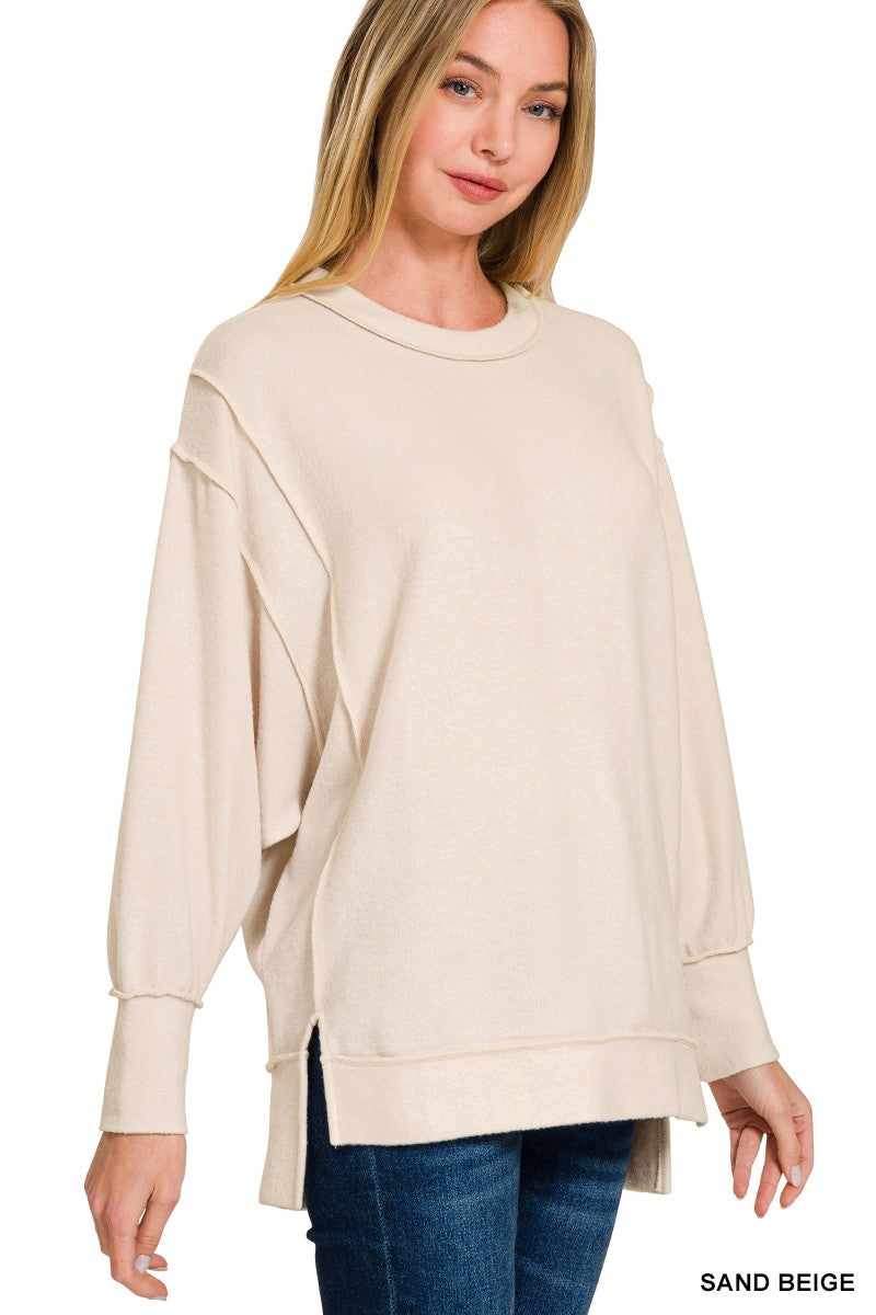OVERSIZED EXPOSED SEAM SWEATER