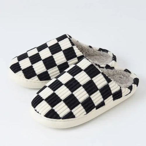 BLACK AND WHITE SLIPPERS