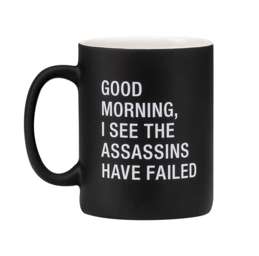 I SEE THE ASSASSINS HAVE FAILED COFFEE MUG